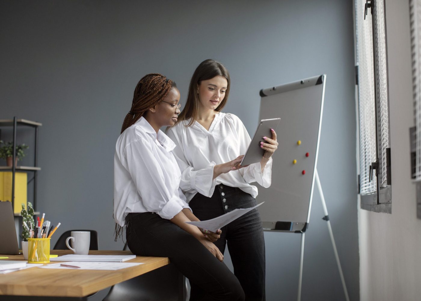 beautiful-women-working-together-startup-company