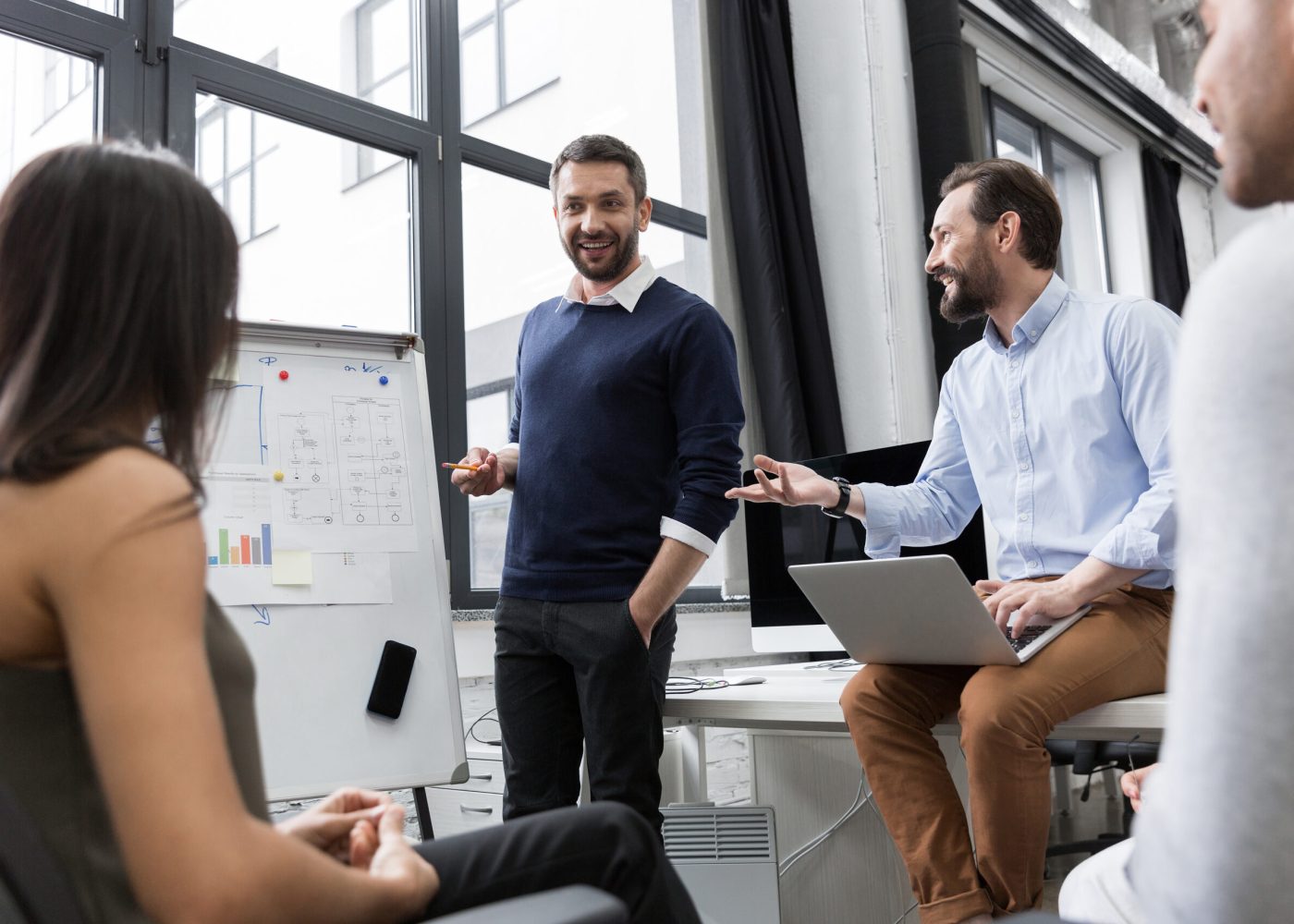 Business coworkers discussing new ideas and brainstorming in office