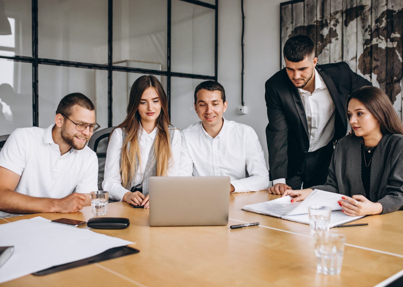 Group of people working out business plan in an office