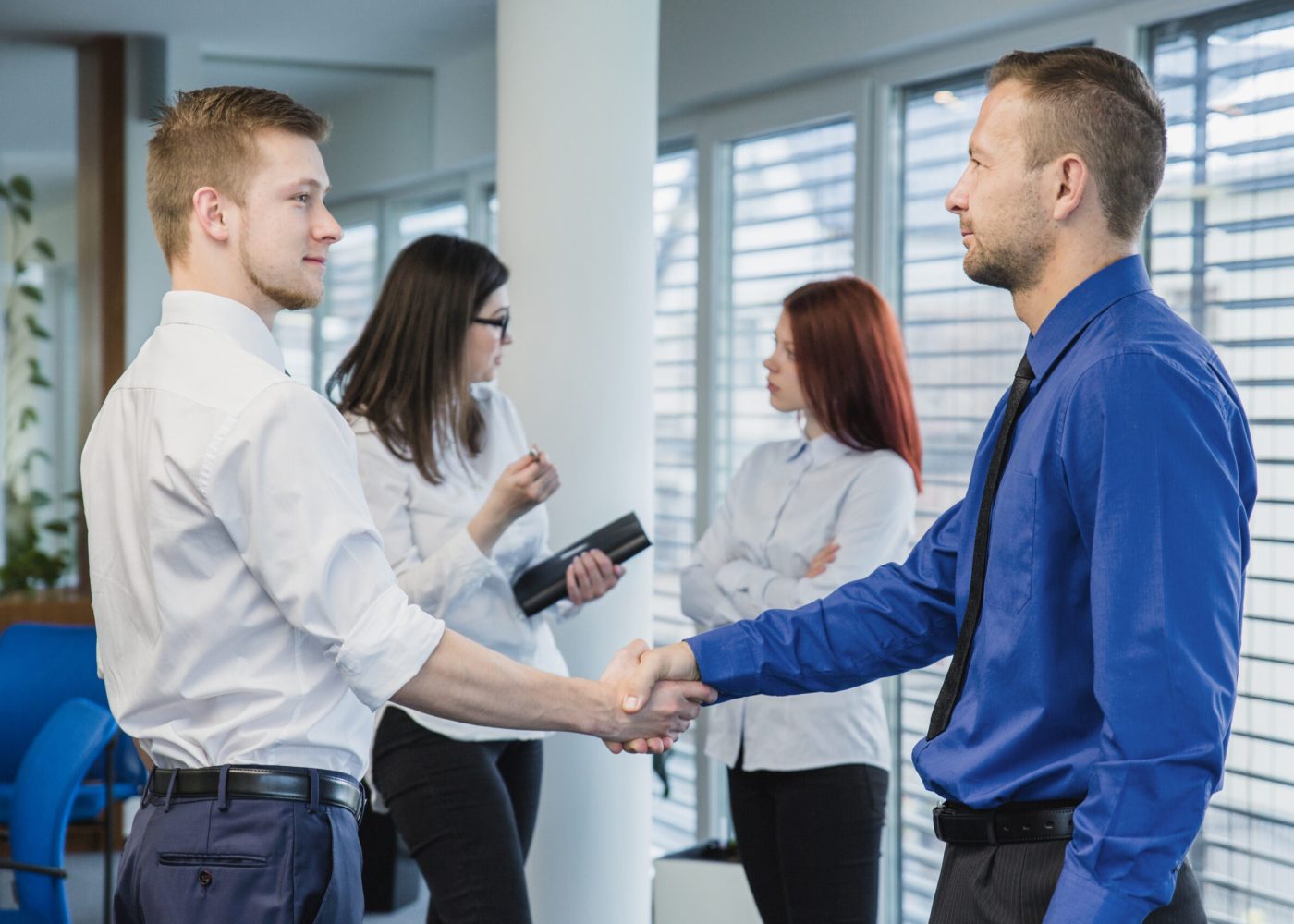 men-shaking-hands-office